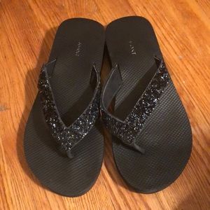 Black, bejeweled, thong sandals; size 10